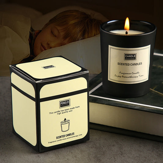 Scented candles in gift packaging