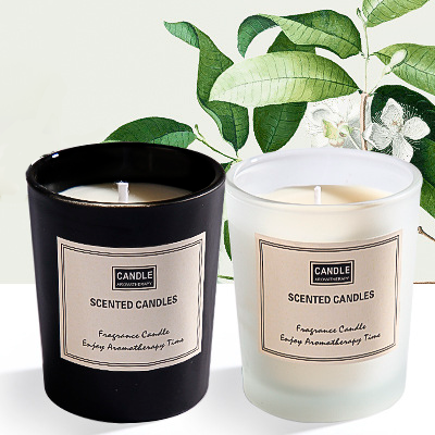 Scented candles in gift packaging