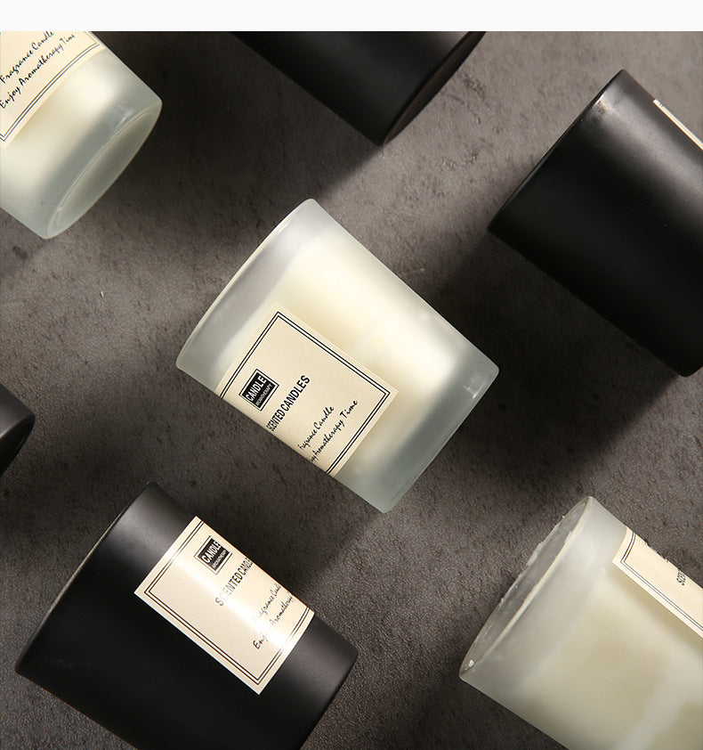 Scented candles in gift packaging